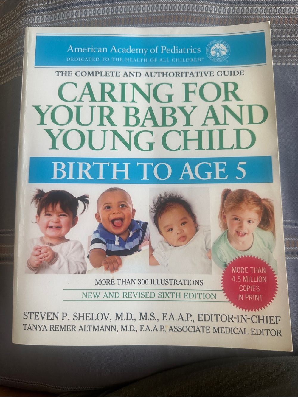 Book Caring for Your Baby and Young Child (Birth to Age 5) - White/Cyan Cover